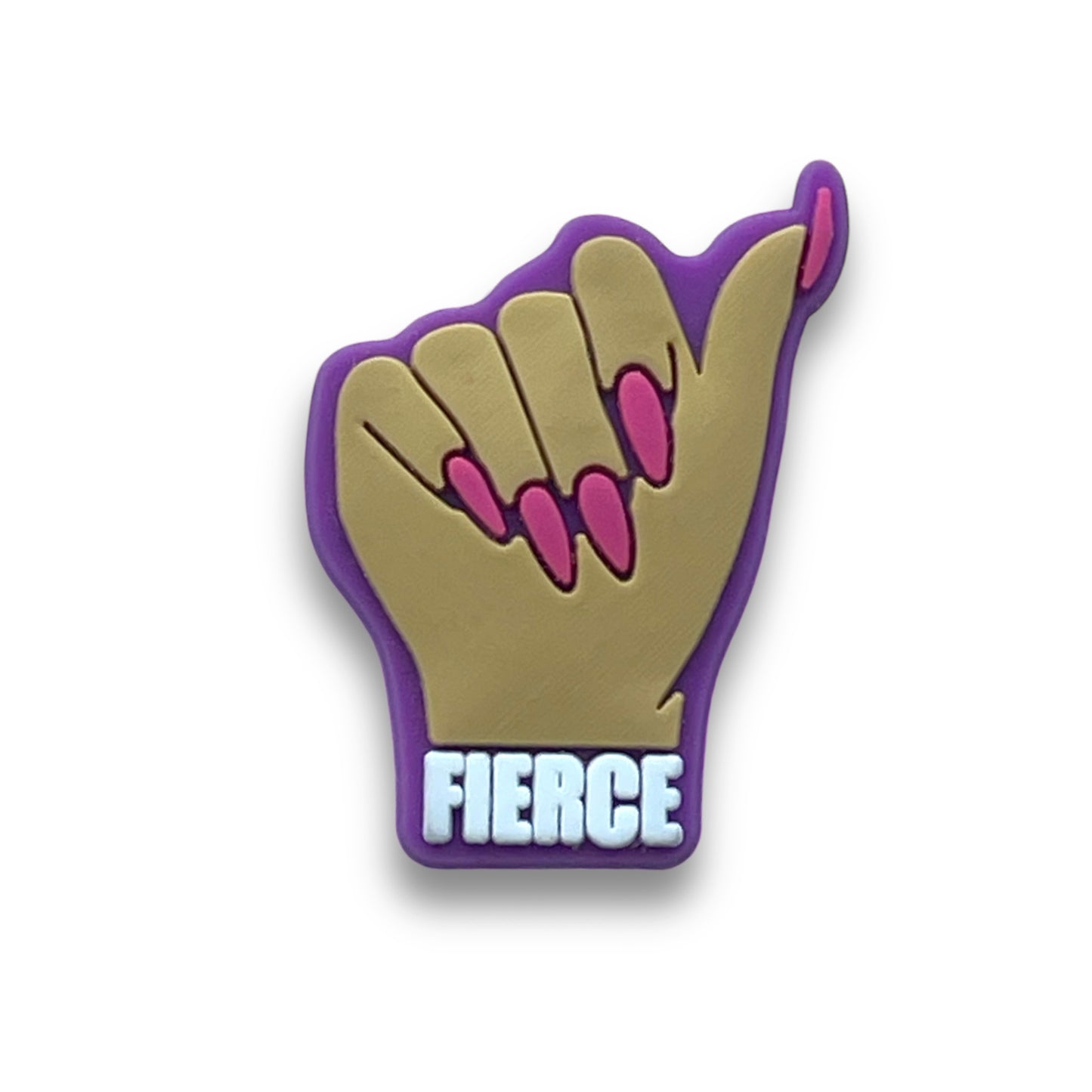 Clog charm of a beige hand with fingers folded down, long pink nails, and the word Fierce written across the wrist.
