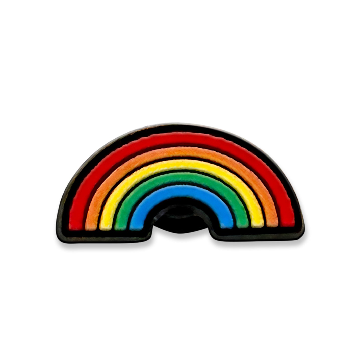 Vibrant clog charm in the shape of an inclusive five color rainbow with black outline.