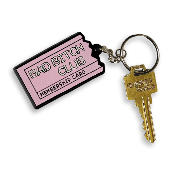 Key tag of a torn pink membership card with the words: Bad Bitch Club.