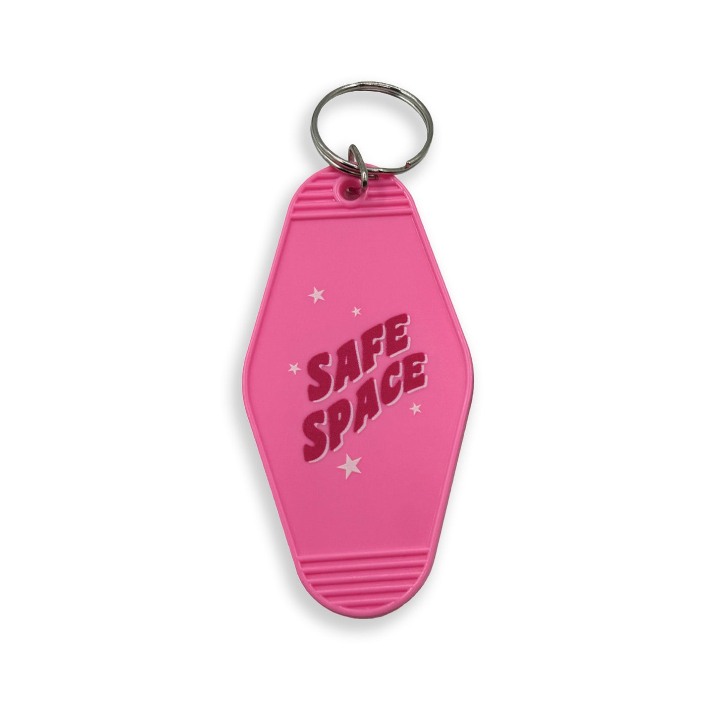 Pink vintage style hotel keychain from Merch Mary, with little white stars, that reads: Safe Space.