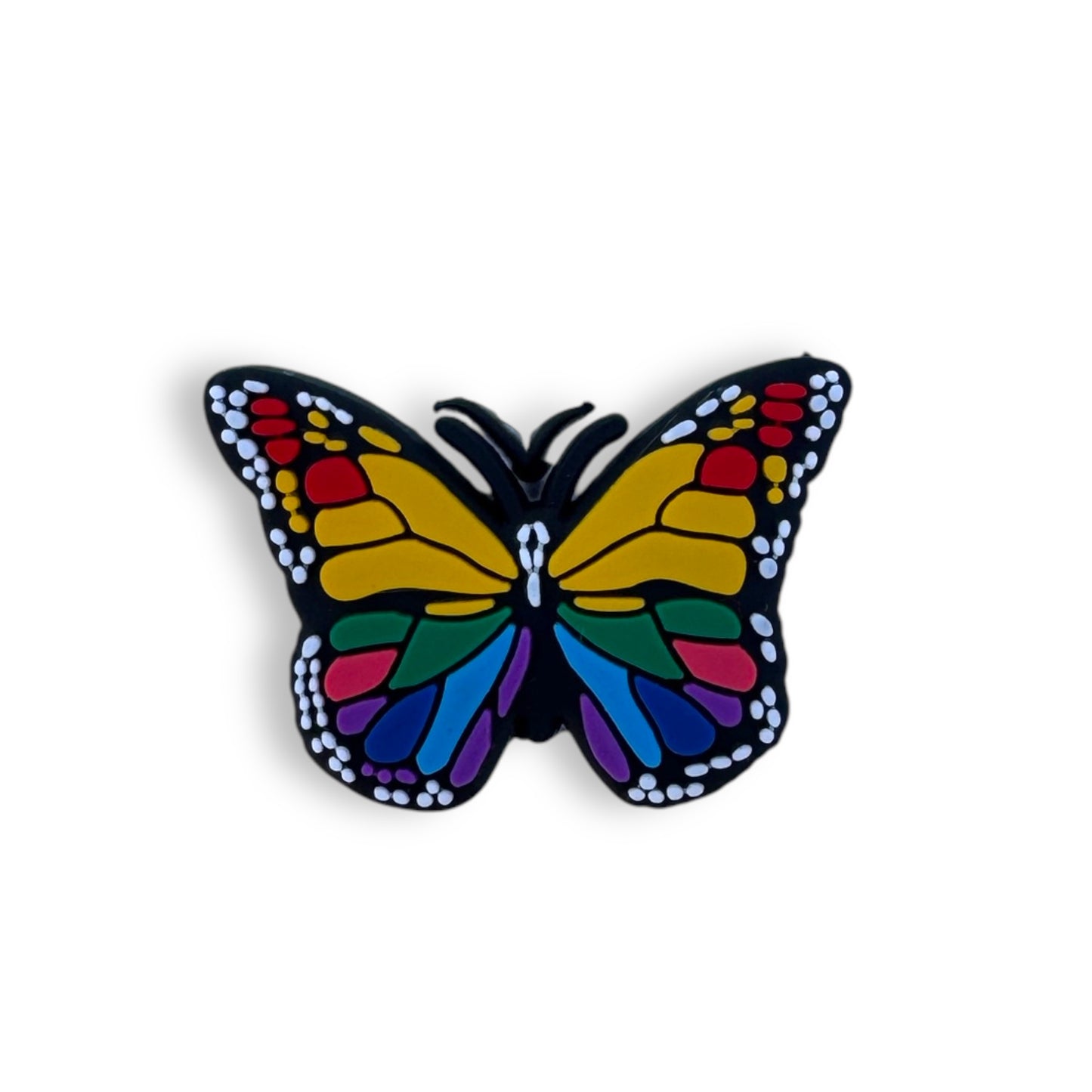 Multi-colored butterfly clog charm.