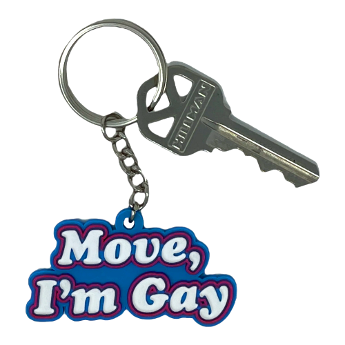 White, hot pink and blue keychain shaped around the words: Move, I'm Gay.