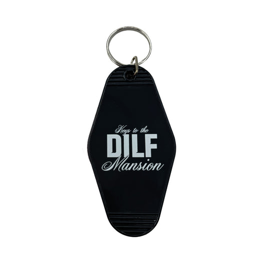 Black vintage-shaped motel keychain with: Keys to the DILF Mansion, written in white.