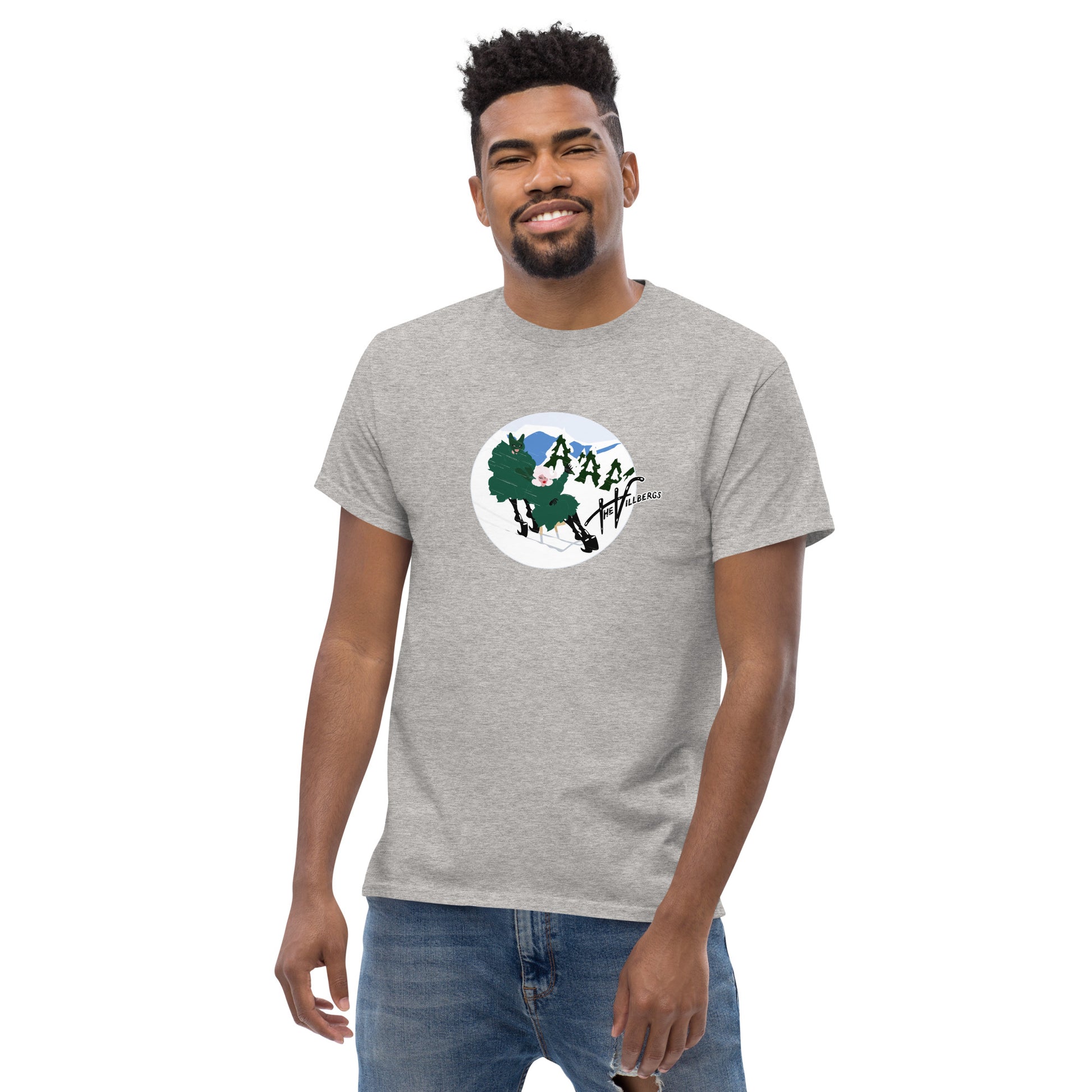 Male model in sport grey shirt, with the white, green, blue and black colored Villbergs winter cartoon.