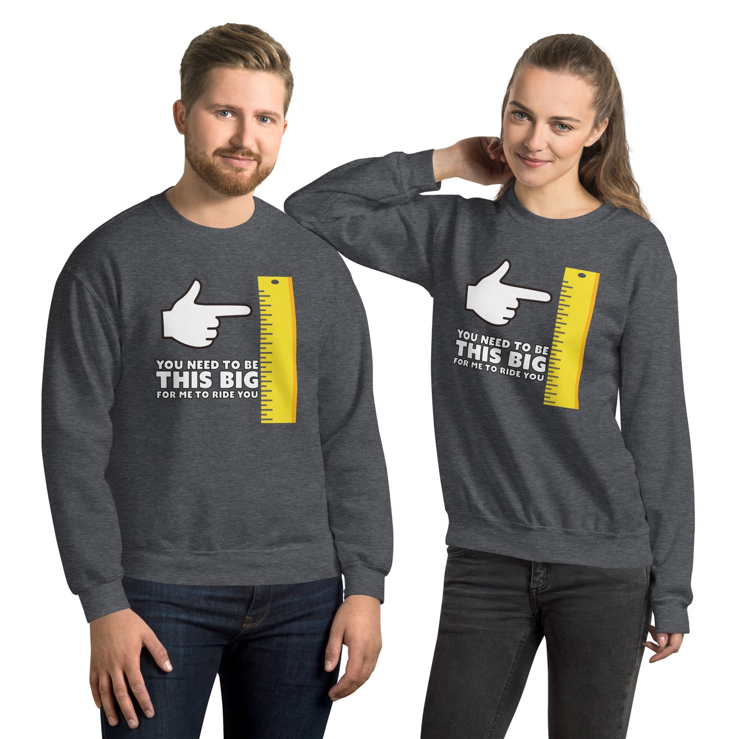 Couple wears dark heather sweaters with, You need to be this big for me to ride you graphic.
