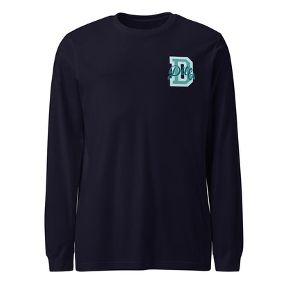 Navy blue shirt, teal blues varsity graphic.