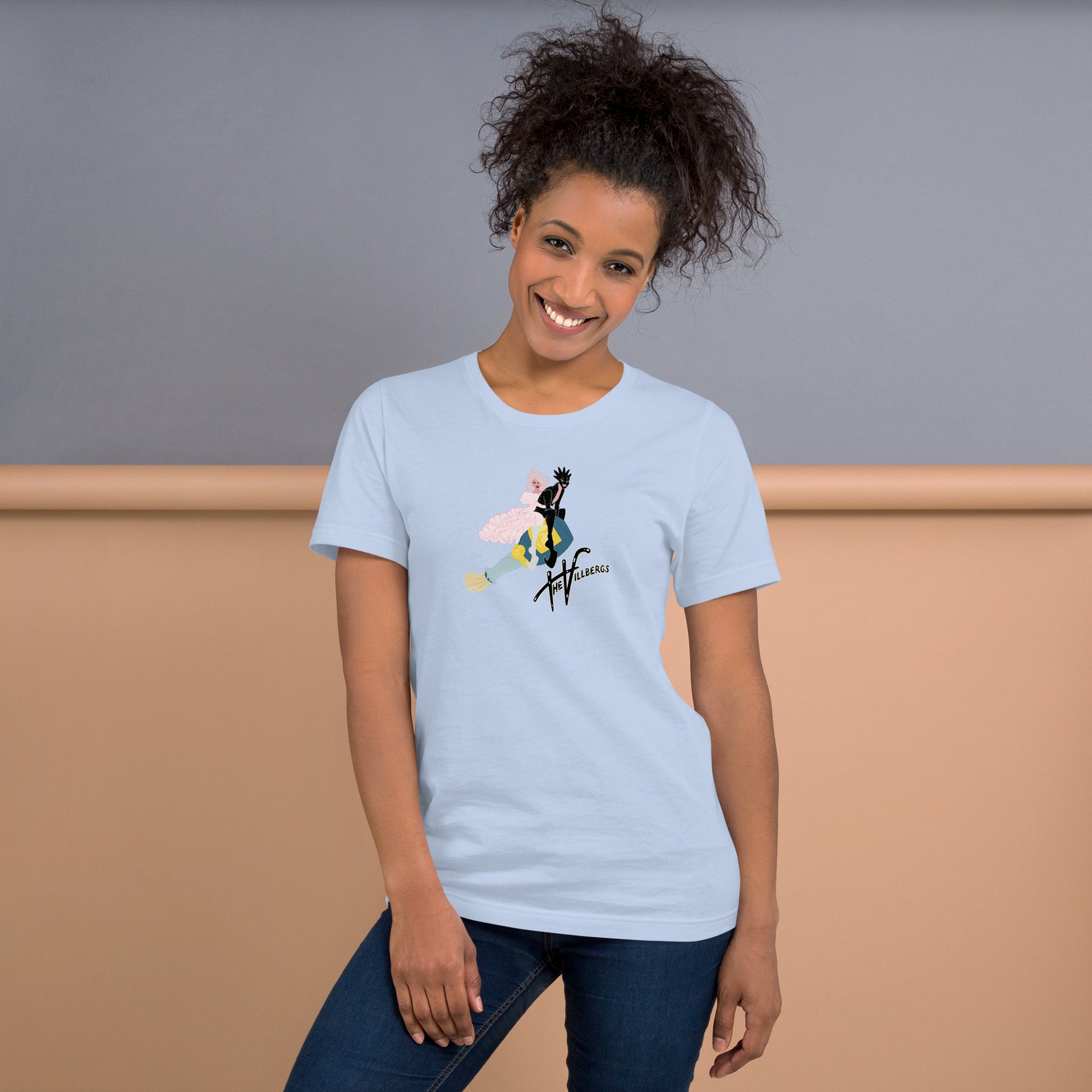 Baby Blue T-shirt with the Villbergs riding a popped champagne bottle through the sky.